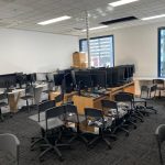 AIAT lab desks with monitors, keyboards and LAN connections set up by Go Click On in Victoria, Australia